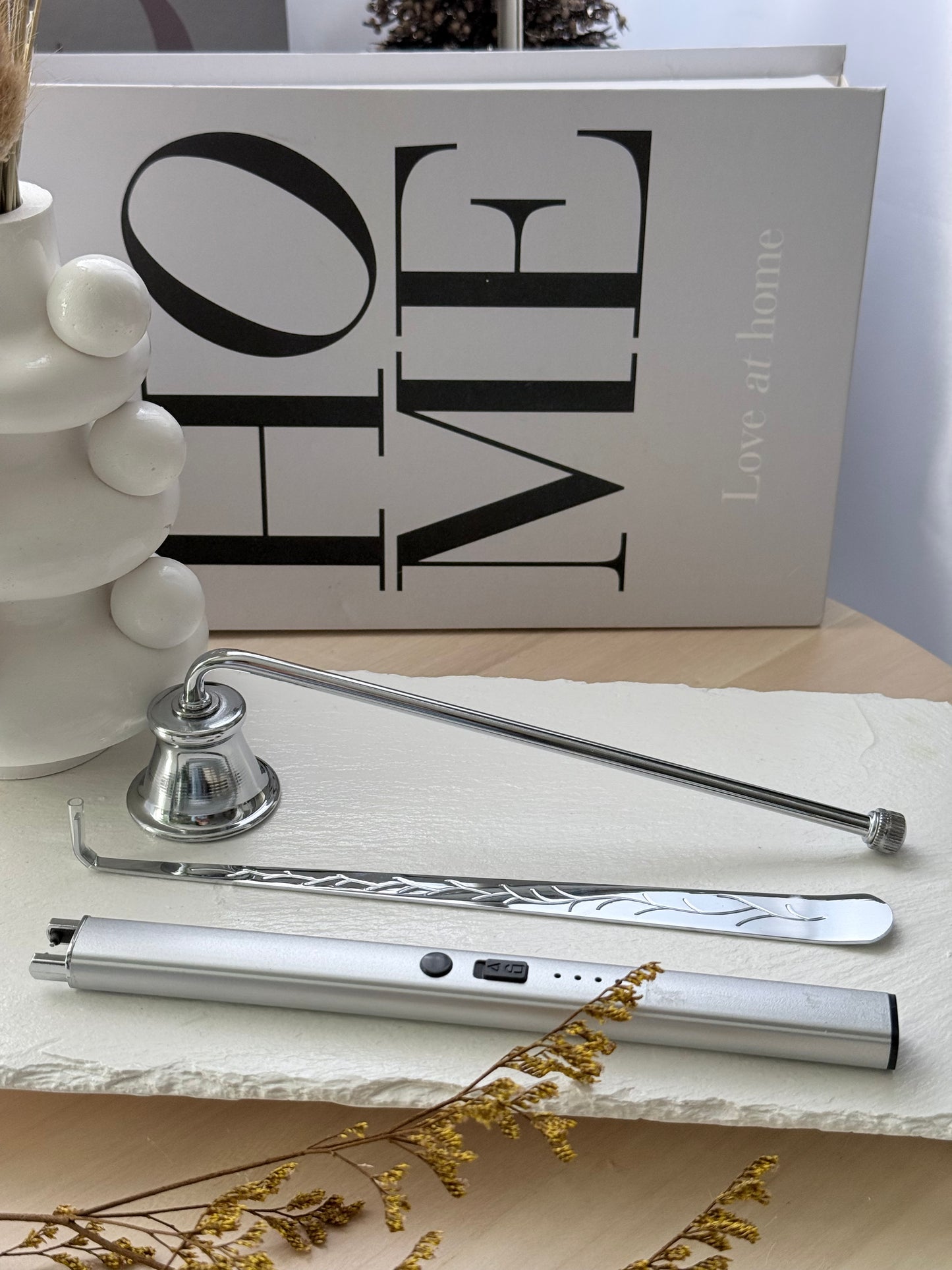 Set plateado moderno para el mantenimiento de velas