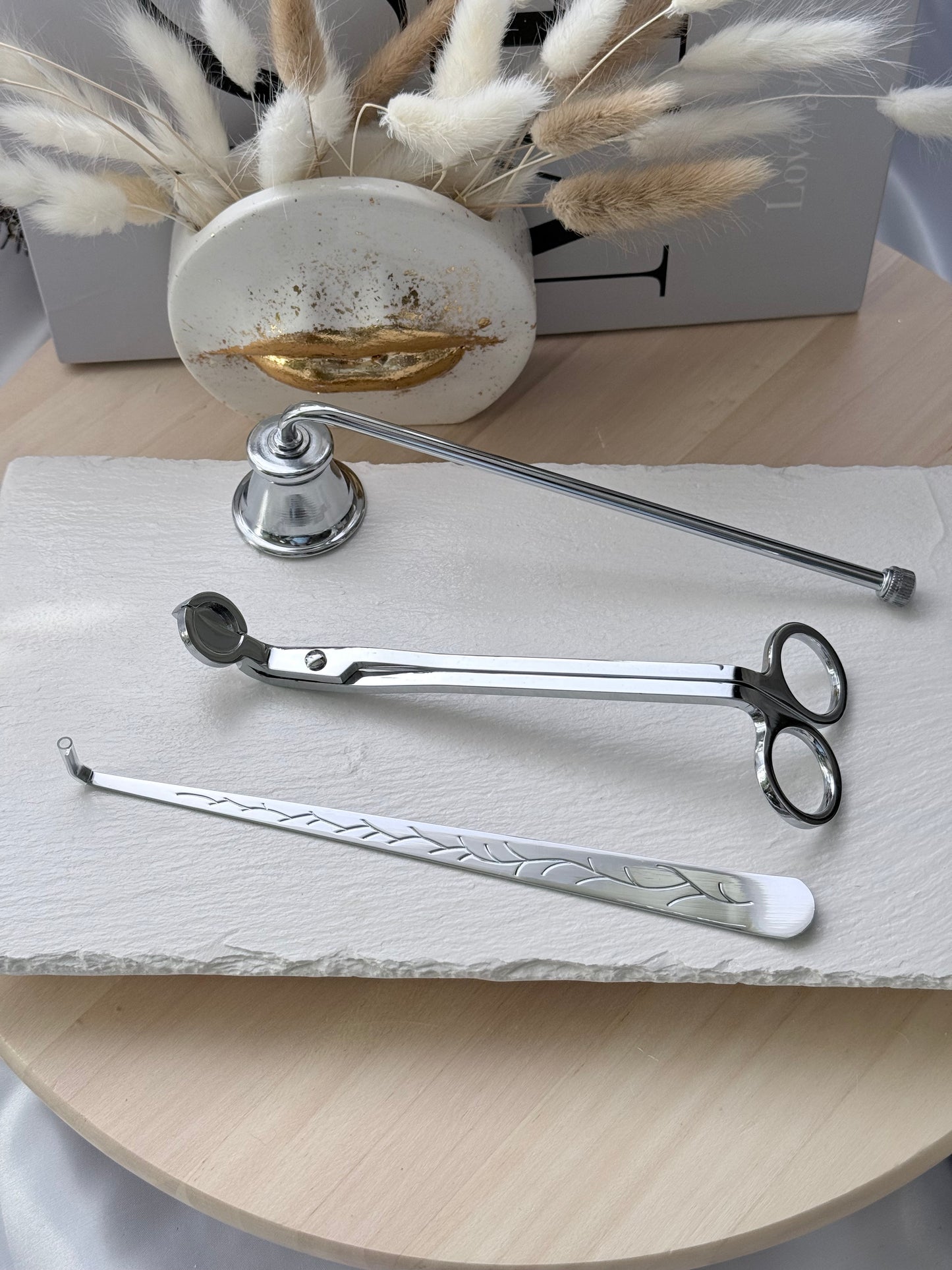 Set plateado de herramientas para el cuidado de velas