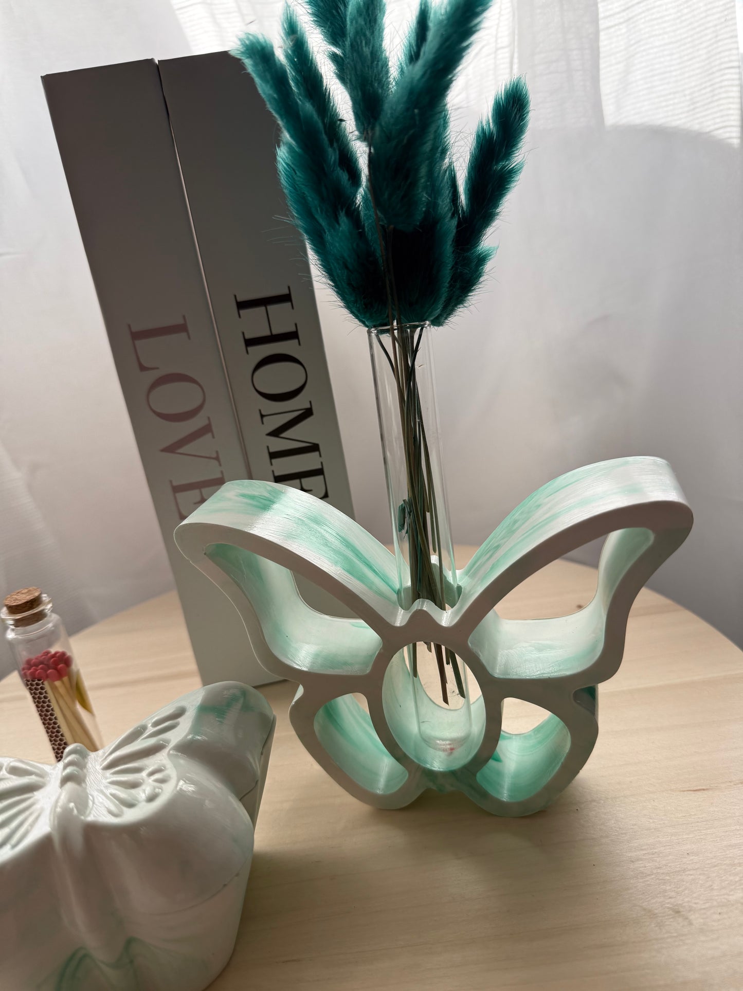 Florero mariposa