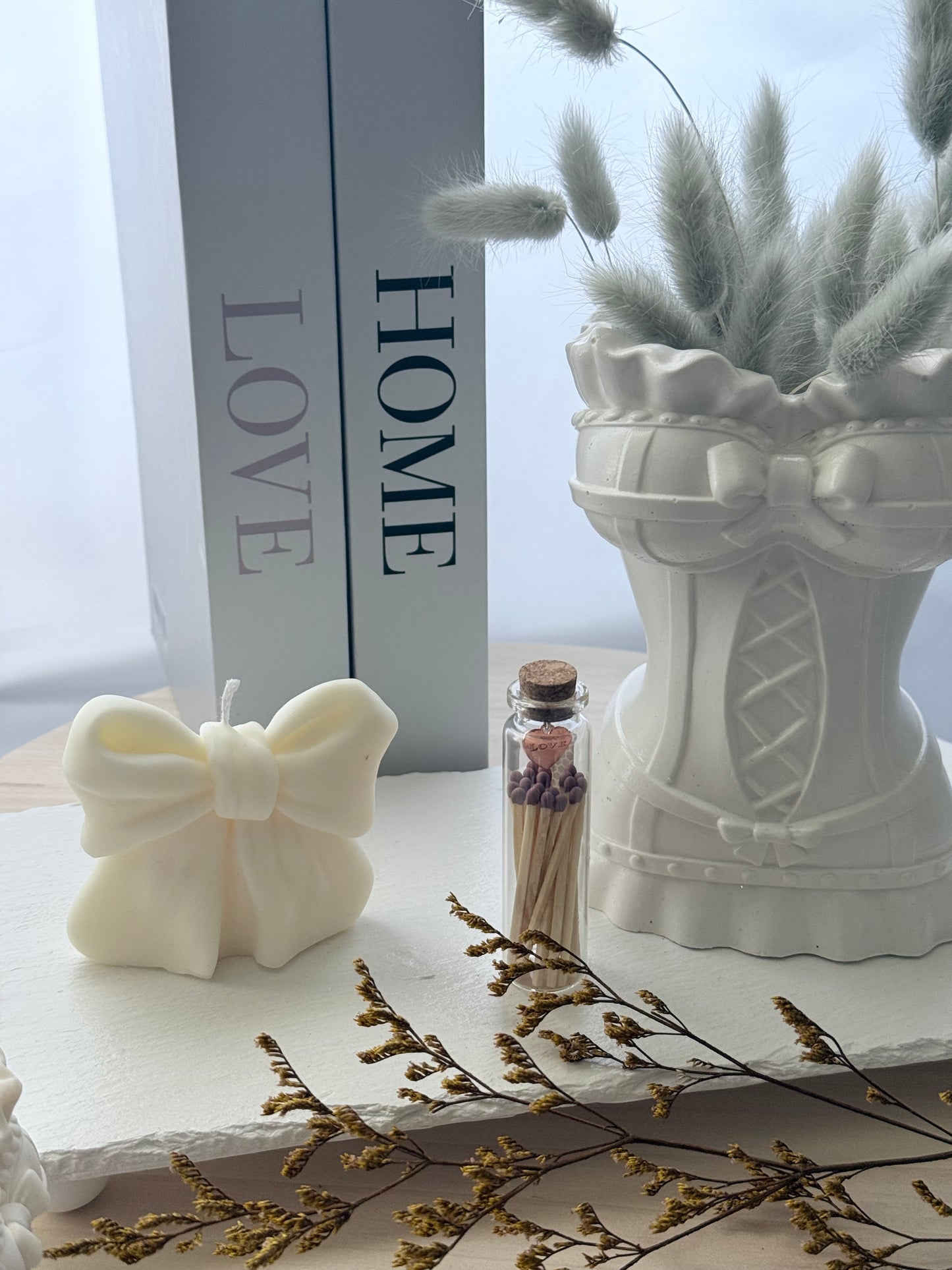 Vela Decorativa en Forma de Lazo
